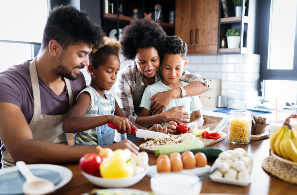 Family making a meal full of nutrients for eye health.