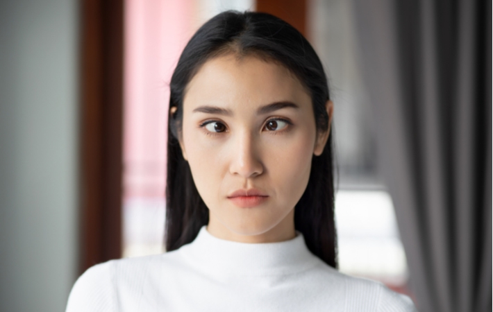 A woman with crossed eyes, a condition referred to as strabismus