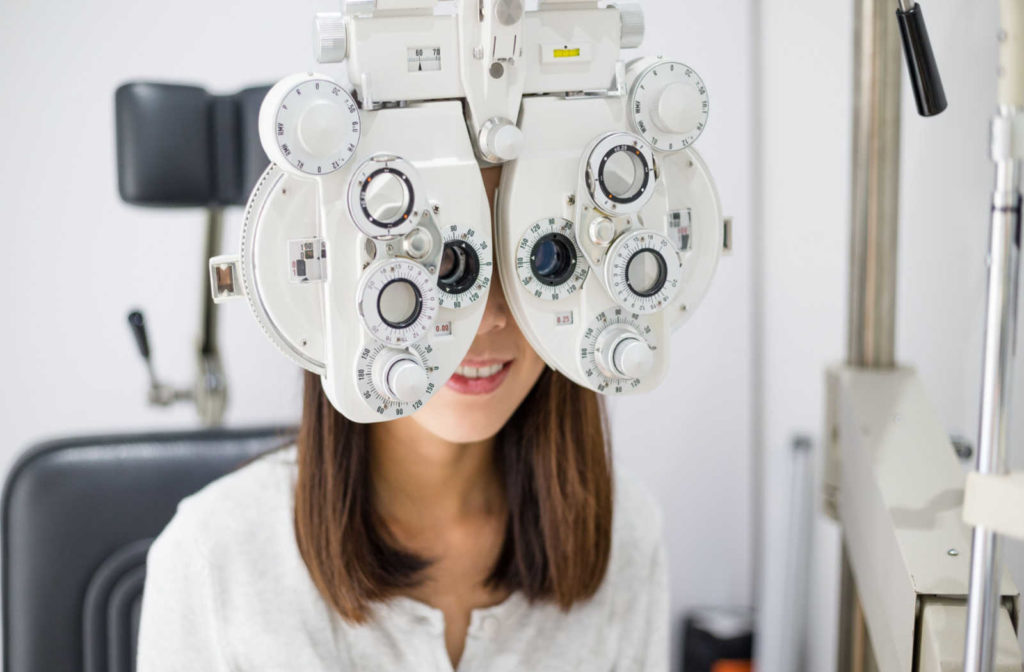 A patient getting their eyes examined to ensure the progression of myopia does not lead to further vision problems